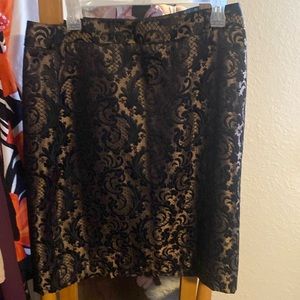 New Worthington black and gold skirt. Never worn. Beautiful skirt.
